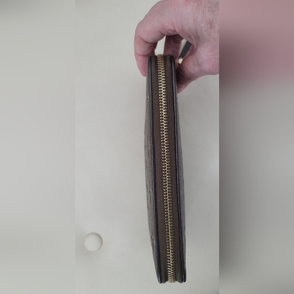 Louis Vuitton Monogram Empreinte Zippy Wallet in brown - Picture 2 of 12